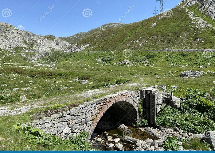 Gotthard Pass Old Stone Bridges Over Alpine Streams on the Alpine Mountain St ... photo