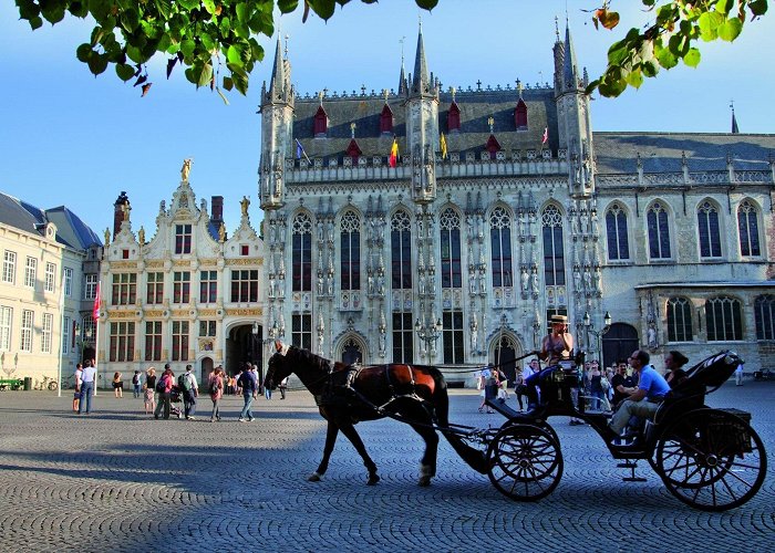 Burg Square Exploring art and architecture on a walking tour through Bruges photo