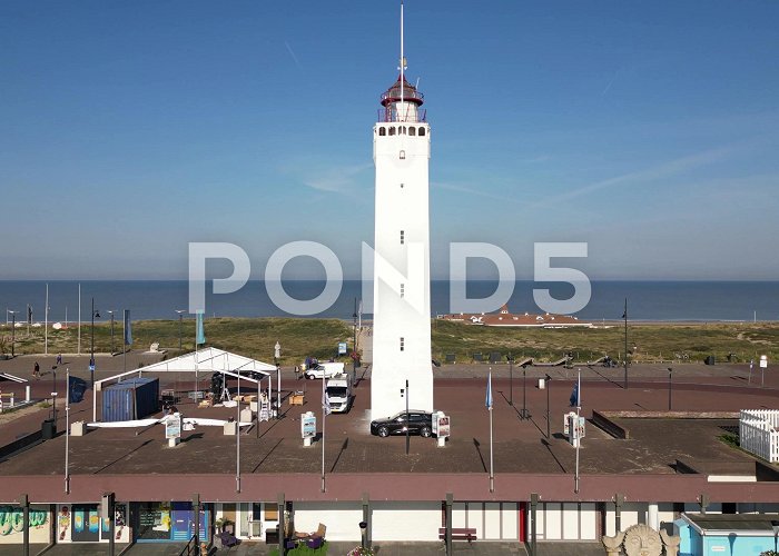Lighthouse Noordwijk lighthouse at Noordwijk Aan Zee on sunny... | Stock Video | Pond5 photo
