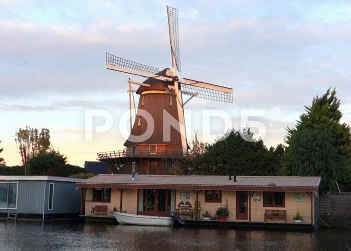 The Sloten Windmill Amsterdam Molen van Sloten at dusk | Stock Video | Pond5 photo
