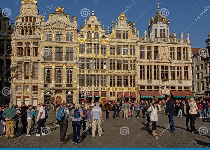 The Guild Houses Many Tourists in Front of Medieval Guild Houses in Brussels Gran ... photo