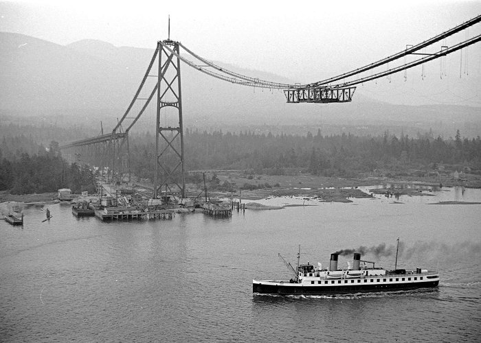 Lion Gate Bridge 80 years ago people walked across the Lions Gate Bridge for the ... photo