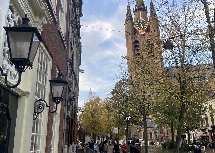 Old Church People of Delft, is this tower crooked or the building on the left ... photo