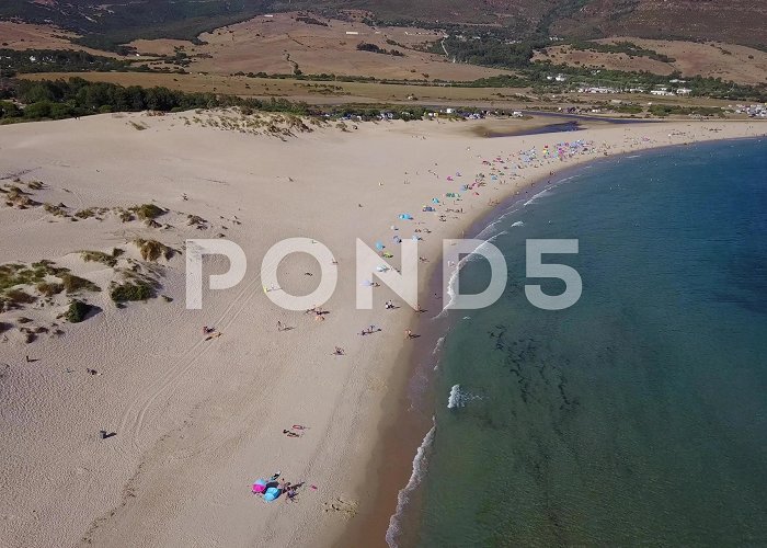 Playa de Valdevaqueros Aerial view of the sand huge dunes of Pu... | Stock Video | Pond5 photo