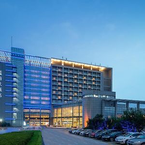 Qingdao Blue Horizon Hotel Huangdao Exterior photo