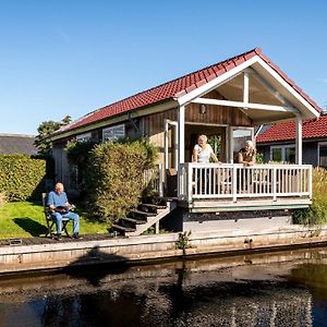 Cozy Chalet Right On The Water In Friesland Villa Akkrum Exterior photo