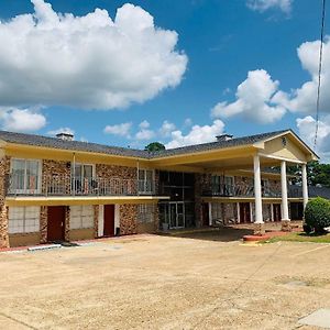 Coachman'S Inn Magnolia Exterior photo